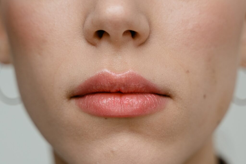  A woman with pink healthy lips